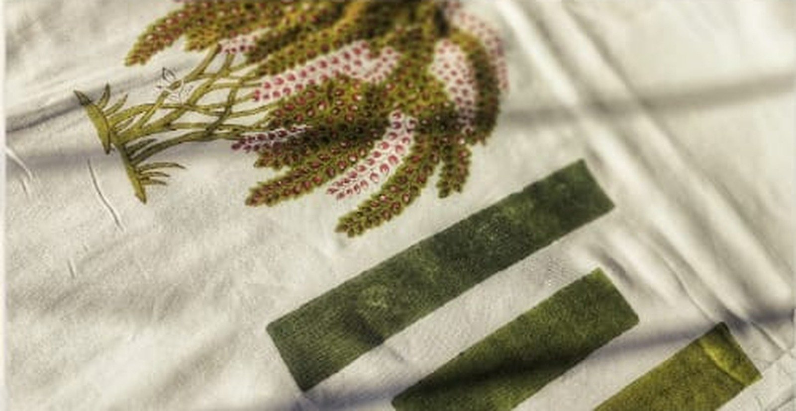 Hand-printed textile detail with botanical imprint